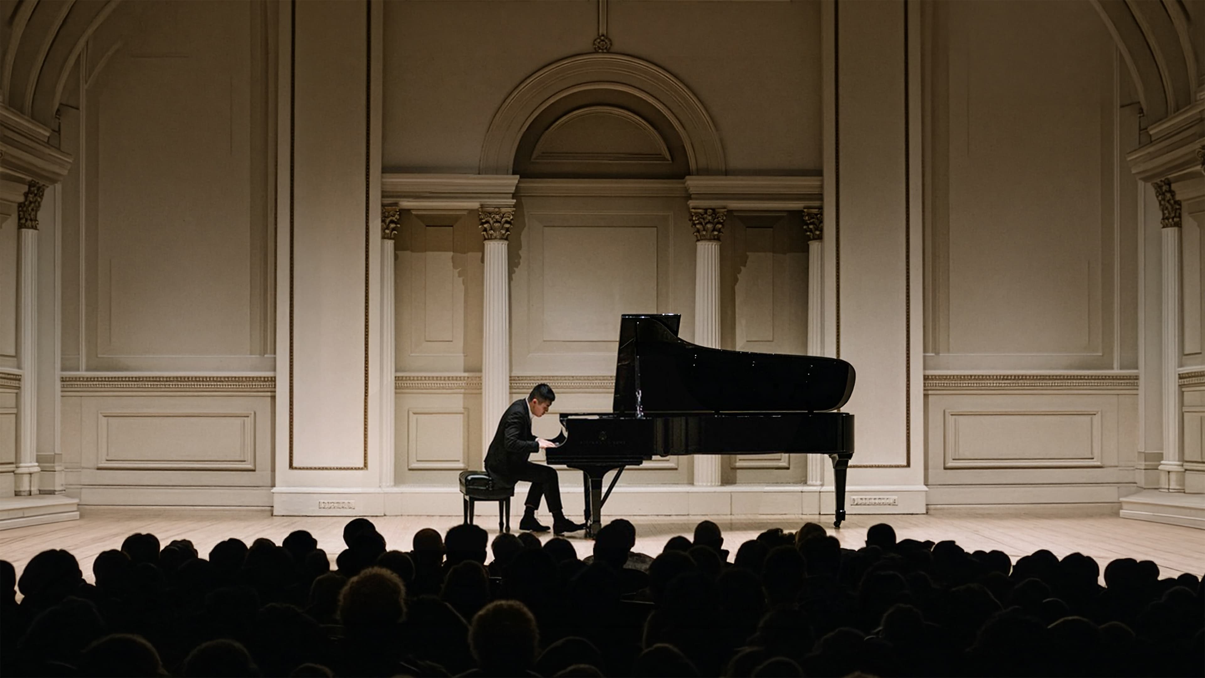 Lionel Yu performing at a concert hall